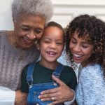 elderly woman with daughter and granddaughter