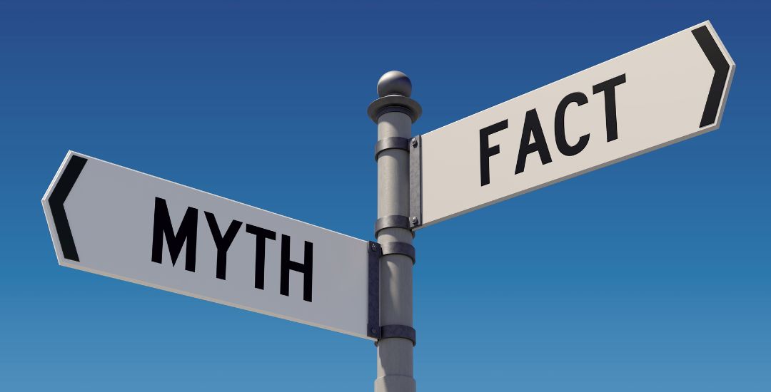 myth fact directional sign