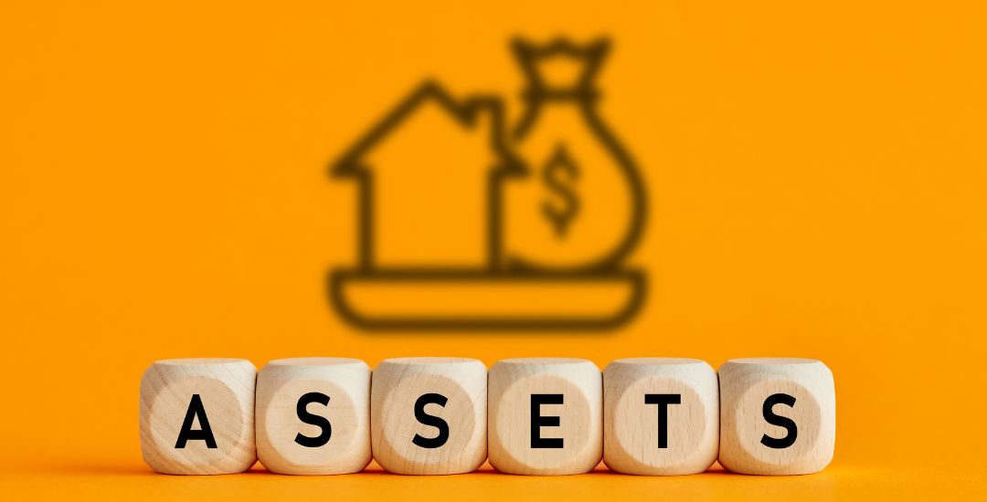assets on block letters with orange background