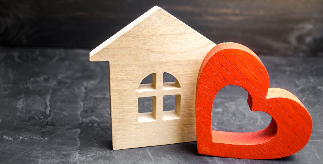 wooden house and red heart