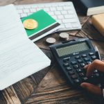 financial book and calculator