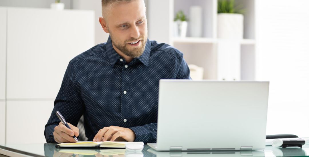 professional man on laptop video call